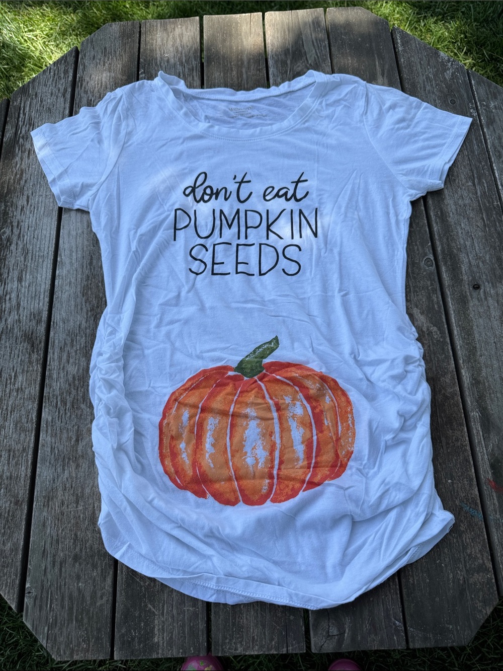 White Maternity Tee with Pumpkin Graphic - "Don't Eat Pumpkin Seeds"